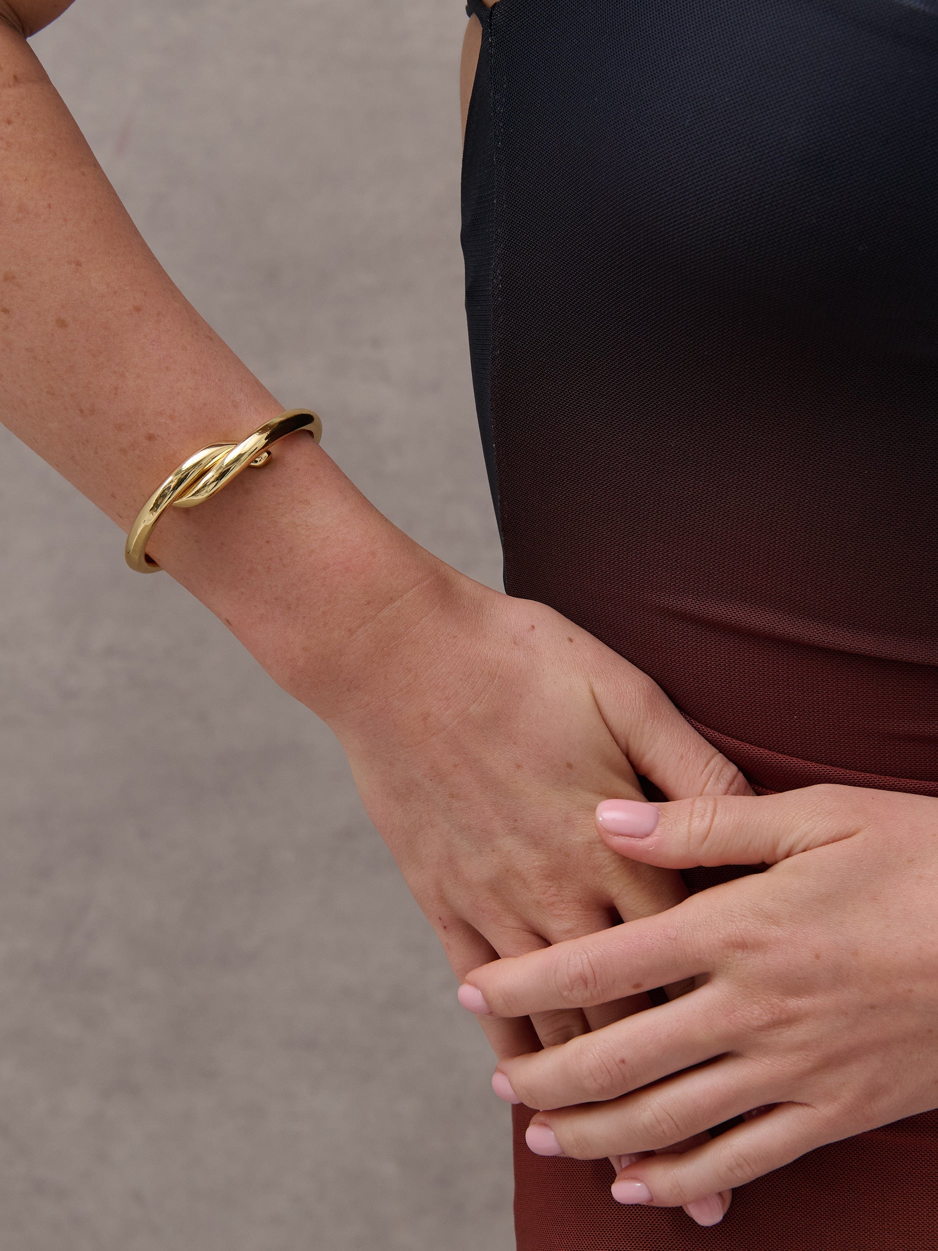 Mia Interlock Twist Bangle - 18K Gold Plated