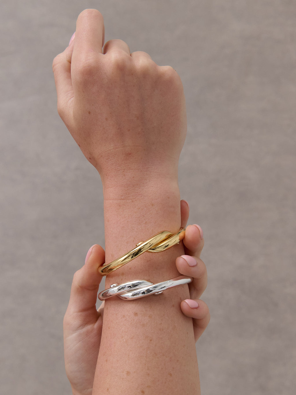 Mia Interlock Twist Bangle - Sterling Silver Plated