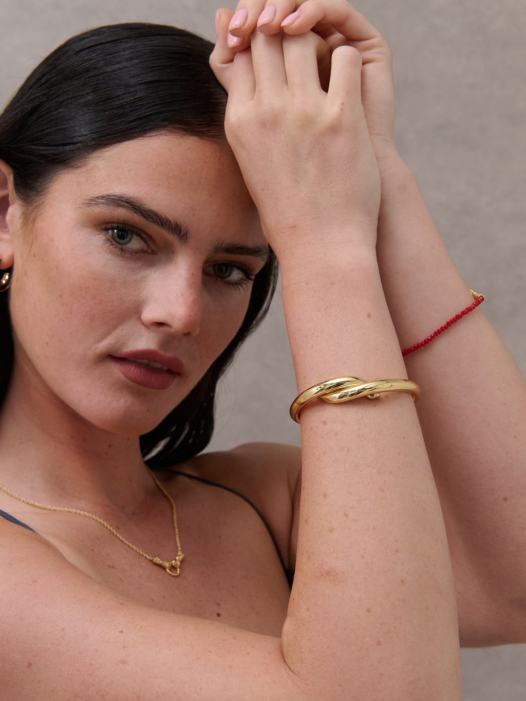 Mia Interlock Twist Bangle - 18K Gold Plated