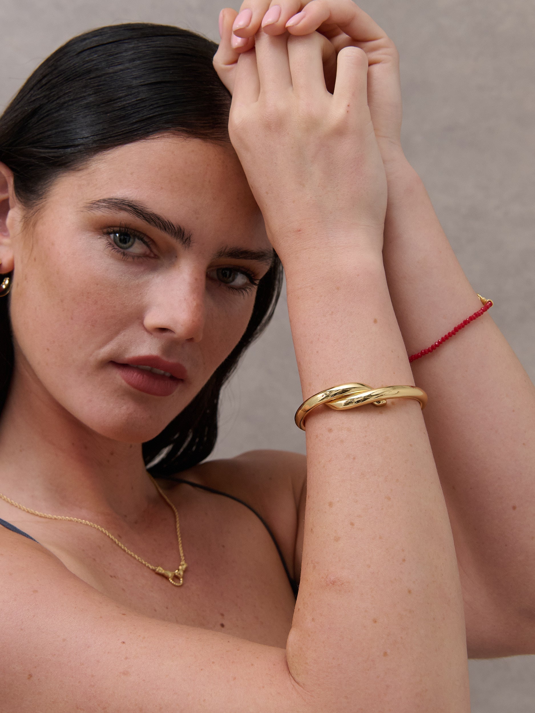Mia Interlock Twist Bangle - 18K Gold Plated