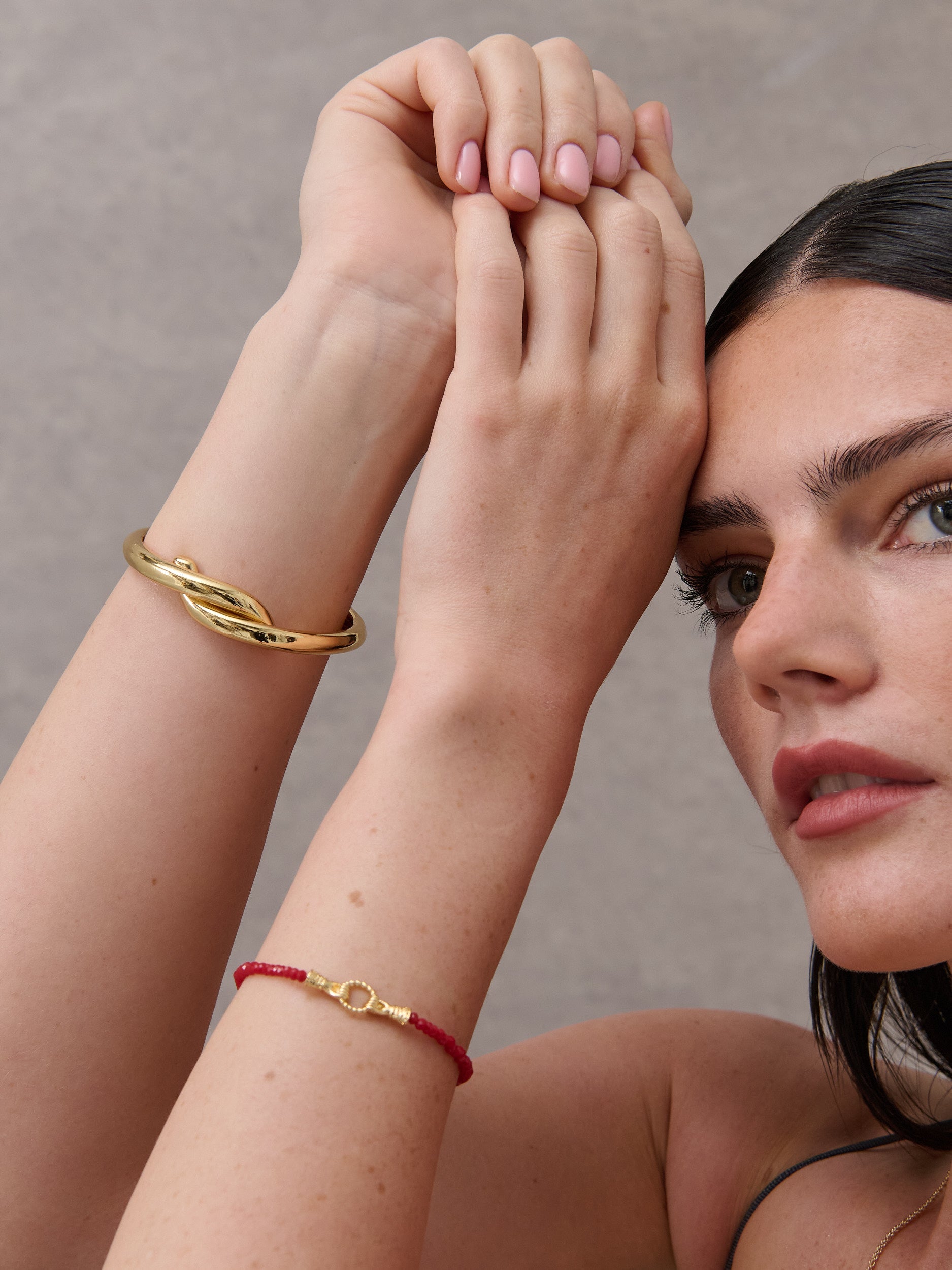 Mia Interlock Twist Bangle - 18K Gold Plated