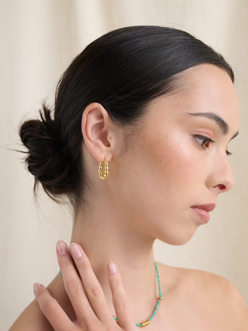 Bally Twisted Earrings in 18K Gold Plated