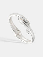 Mia Interlock Twist Bangle - Sterling Silver Plated