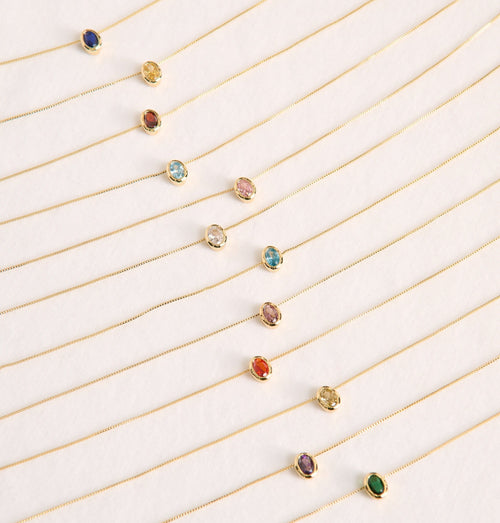 Set of beautiful gold birthstone necklaces made for personalisation or a meaningful gift